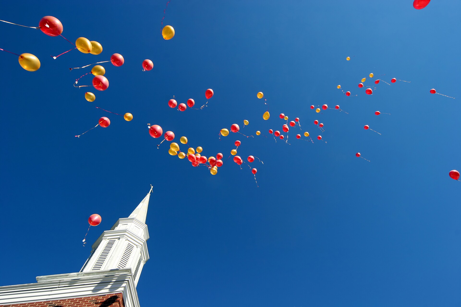 Red And Yellow Balloons Floating Skyward After A Wedding Shutterstock 2123194 1920 Photo Shutterstock